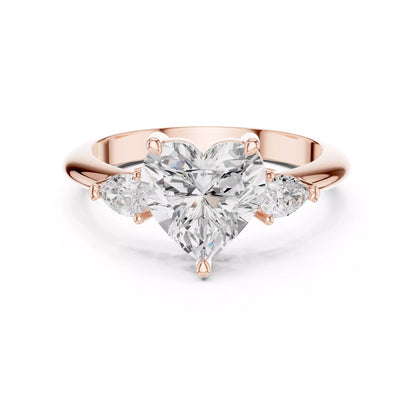Three Stone Heart And Pear Cut Engagement Ring in Rose Gold - front view