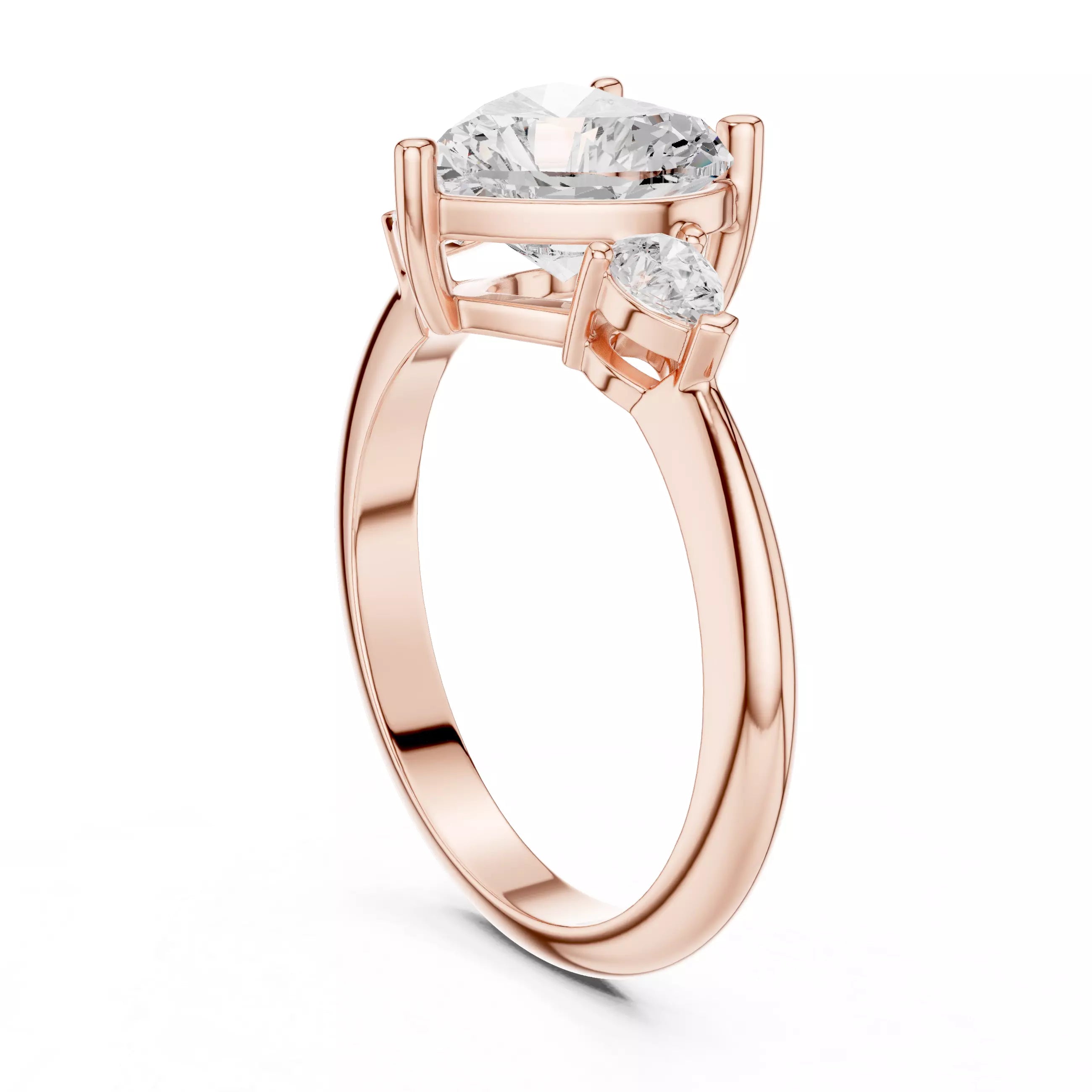 Three Stone Heart And Pear Cut Engagement Ring in Rose Gold - side view