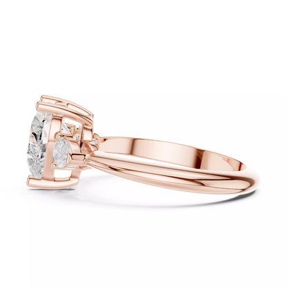 Three Stone Heart And Pear Cut Engagement Ring in Rose Gold - detail view