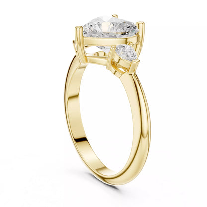 Three Stone Heart And Pear Cut Engagement Ring in Yellow Gold - side view