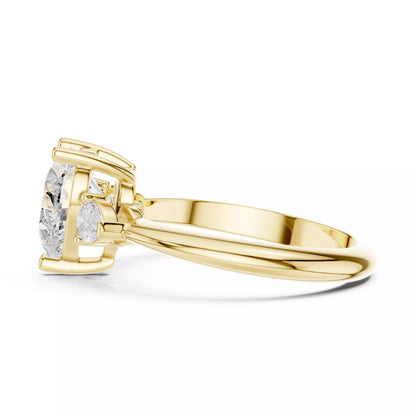 Three Stone Heart And Pear Cut Engagement Ring in Yellow Gold - angle view